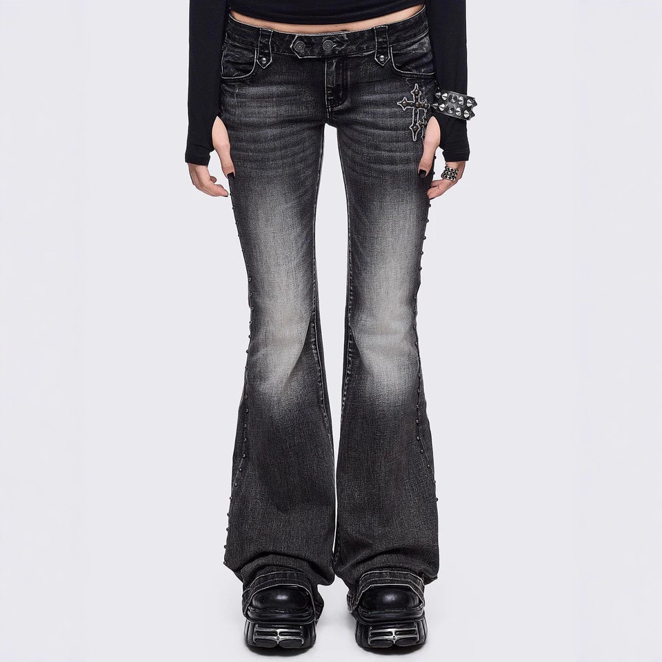 Women's black low-rise flare jeans with an ice-wash finish, full-length legs, and non-stretch denim fabric